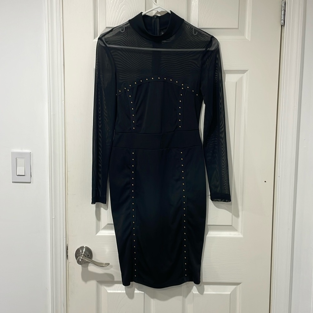 Black see-through dress on shoulders& arms .